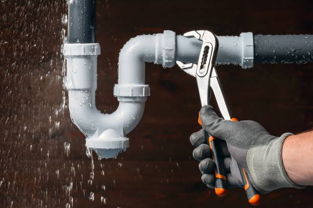 Professional Plumbing technician working in Harrah, WA